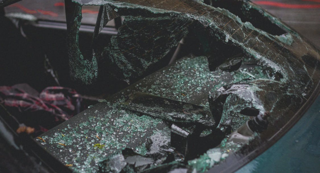 A close-up of a broken windshield.