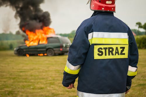 A rescue worker assessing an accident scene, underscoring the importance of professional support
