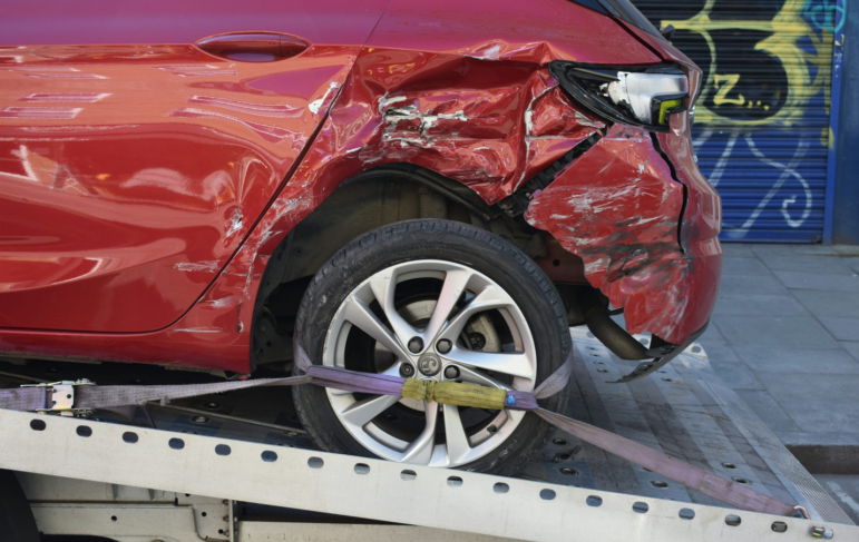 A broken car after an accident requiring a federal criminal lawyer