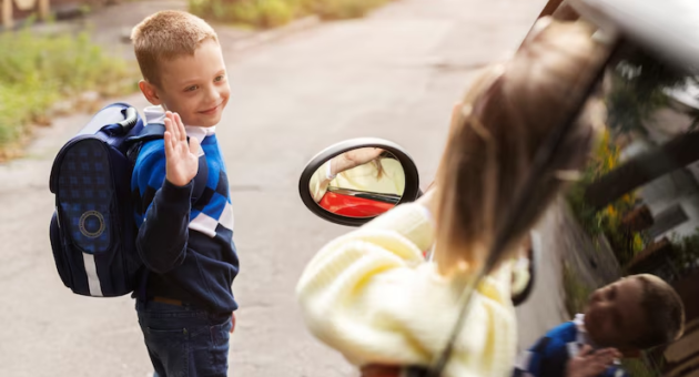 A child bidding farewell to his family