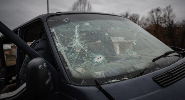 close-up of a broken windshield after a car accident