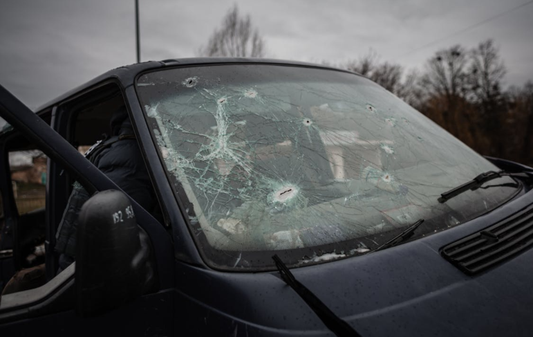 close-up of a broken windshield after a car accident