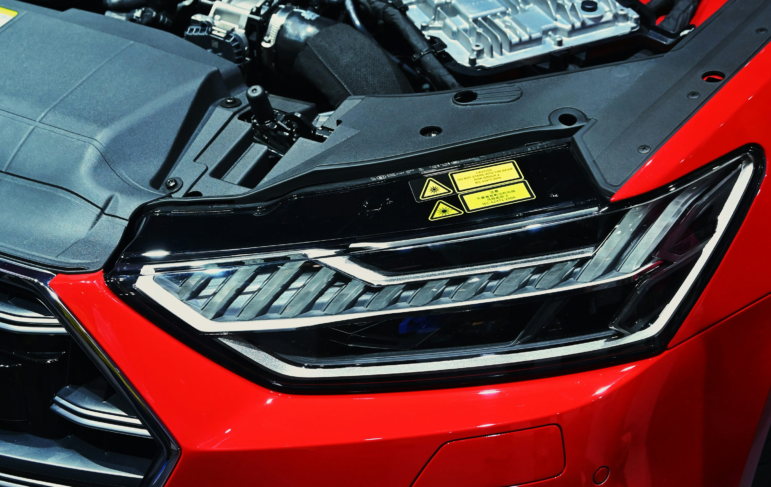 A red and black Honda car