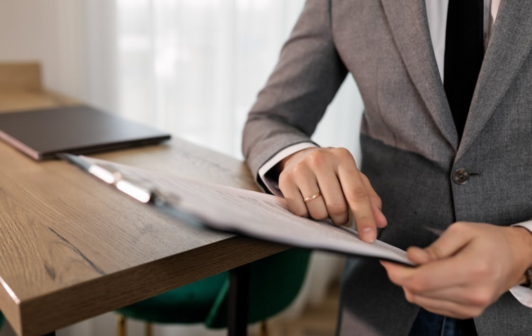 a man going through a document